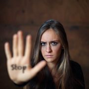 The Honest Truth About Your Partner’s Anger Issues – Sandra Harewood Counselling Frightened woman with her arm outstretched with the word stop written on her hand. The Honest Truth About Your Partner's Anger Issues. Sandra Harewood Counselling
