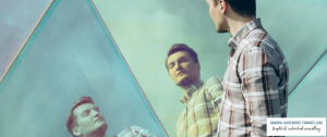 Man Looking In Three Way Mirror - Is My Partner A Narcissist - The Dance Between Narcissus and Echo - Sandra Harewood Counselling