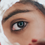 Why Telling Your Story Means You Take Charge Of Your Life = Sandra Harewood Counselling Woman Looking Through A Lens - Why Telling Your Story Means You Take Charge Of Your Life = Sandra Harewood Counselling