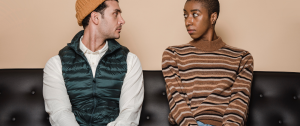 Mixed Race Heterosexual Couple Sitting On A Sofa looking Sad - Should I Stay or Should I Go- Quiz - Sandra Harewood