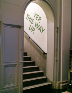 Staircase With Writing This Way Up On The Wall - Clarity And Confidence Coaching - Sandra Harewood