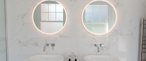 Two round mirrors side by side - Why You Might Think The Worst About Your Partner and What To Do About It - Sandra Harewood