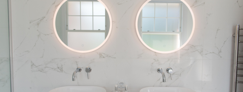 Two round mirrors side by side - Why You Might Think The Worst About Your Partner and What To Do About It - Sandra Harewood