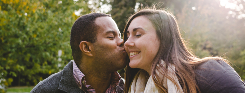 Man Kissing His Girlfriend On The Cheek - Sandra Harewood