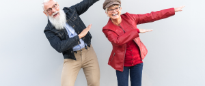 Happy Couple Having Fun Expressing Their Emotions - Sandra Harewood