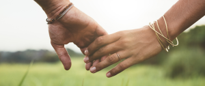 Loving Couple Holding Hands - Sandra Harewood