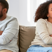 Unhappy Couple Having An Argument At Home - Why Do Couples Have Affairs? - Sandra Harewood