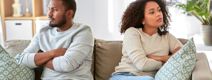 Unhappy Couple Having An Argument At Home - Why Do Couples Have Affairs? - Sandra Harewood