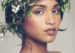 How Archetypes Can Help You Get Unstuck in Your Relationship - Woman of colour wearing a crown of flowers