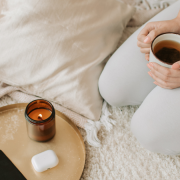 Three Steps to Finding Clarity While Stuck in Relationship Limbo Woman on her knees holding a hot drink in a cup - 3 Steps to Finding Clarity While Stuck in Relationship Limbo