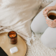 Woman on her knees holding a hot drink in a cup - 3 Steps to Finding Clarity While Stuck in Relationship Limbo