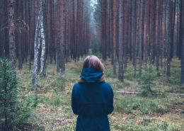 woman contemplating her relationship in the woods - Sandra Harewood