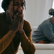 We Have Different Values Should I Stay Or Go Unhappy couple sitting apart on a sofa - We Have Different Values: Should I Stay Or Go?