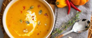 A comforting bowl of Caribbean-inspired nourishing pumpkin soup, rich with red lentils and Bajan herbs. A simple, plant-based recipe that nourishes both body and soul.