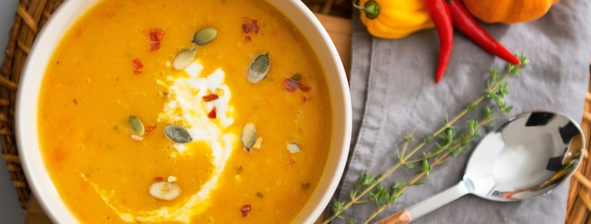 A comforting bowl of Caribbean-inspired nourishing pumpkin soup, rich with red lentils and Bajan herbs. A simple, plant-based recipe that nourishes both body and soul.