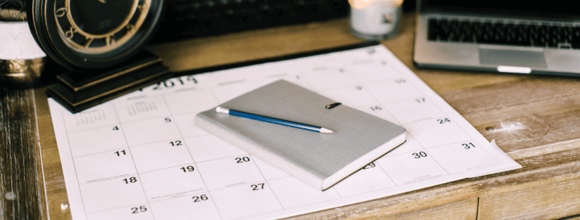 A closed journal and pencil on a desk, representing reflective journalling for relationship clarity.