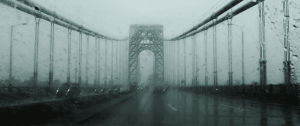 Mist-covered suspension bridge symbolising transition, uncertainty, and emotional thresholds within long-term relationships.