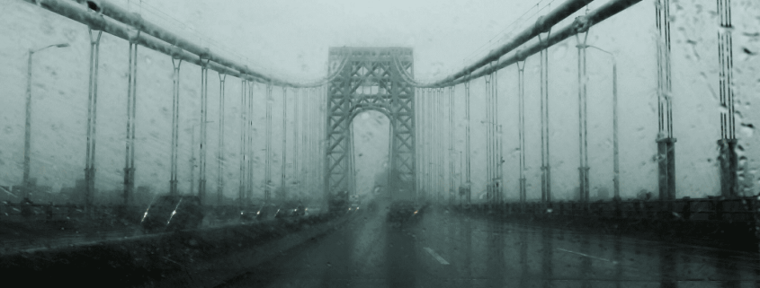 Mist-covered suspension bridge symbolising transition, uncertainty, and emotional thresholds within long-term relationships.