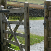 open-gate-symbolising-the-threshold-of-responsibility. An open gate leading to a quiet country path, representing personal responsibility, reflection, and the journey through relationship crossroads.